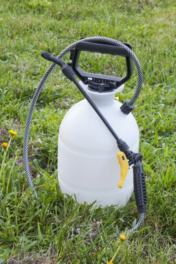 A handheld sprayer to help apply liquid fertilizers to vegetable gardens