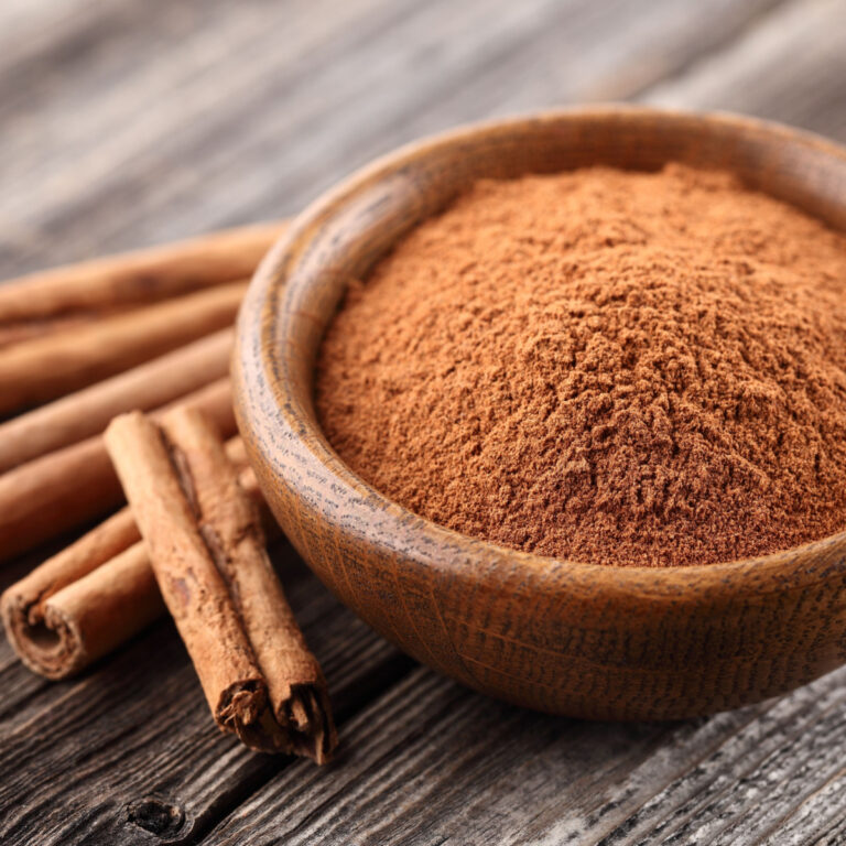 powdered cinnamon and cinnamon sticks