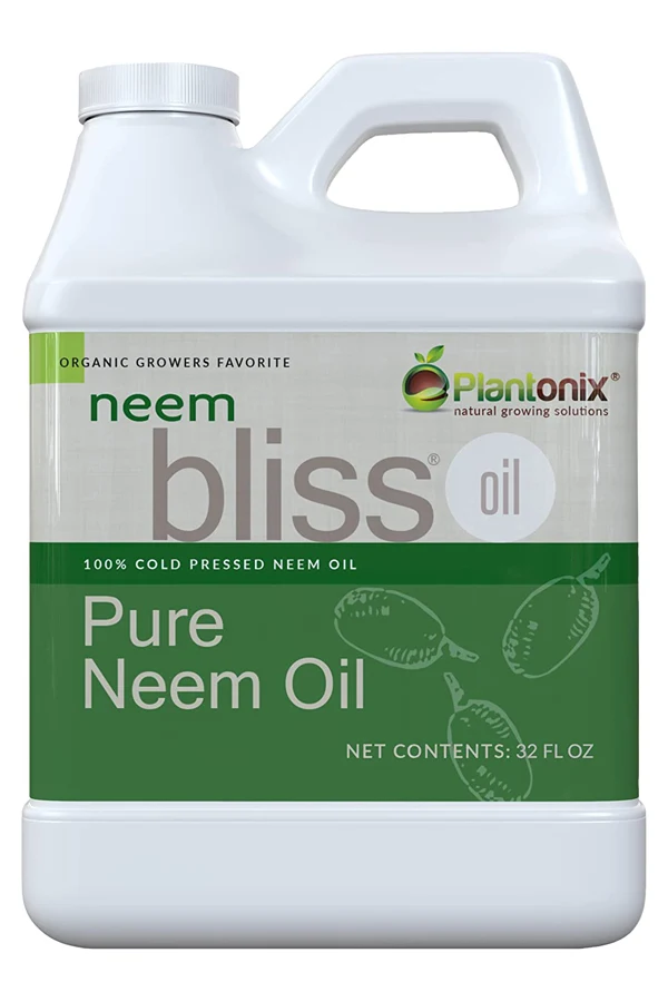 A bottle of Pure Bliss neem oil. - get rid of whiteflies in a vegetable garden